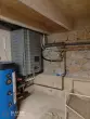 Pompe à chaleur air-eau Arkteos et ballon technique installés dans une résidence à Cassis
